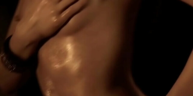 Brunette Woman Dancing Gracefully and Seducing Her Man