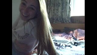 Girl stripping on the web cam and masturbating
