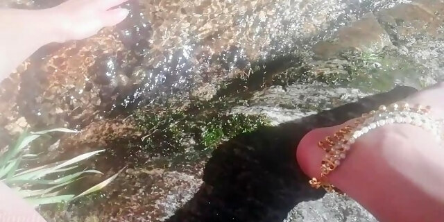 Indian girl cleaning pussy in river near Village
