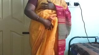 Desi  indian horny tamil telugu kannada malayalam hindi cuckold wifey vanitha dressed in orange colour saree  showing big knockers and clean-shaved pussy press hard boobs press nip rubbing pussy masturbation